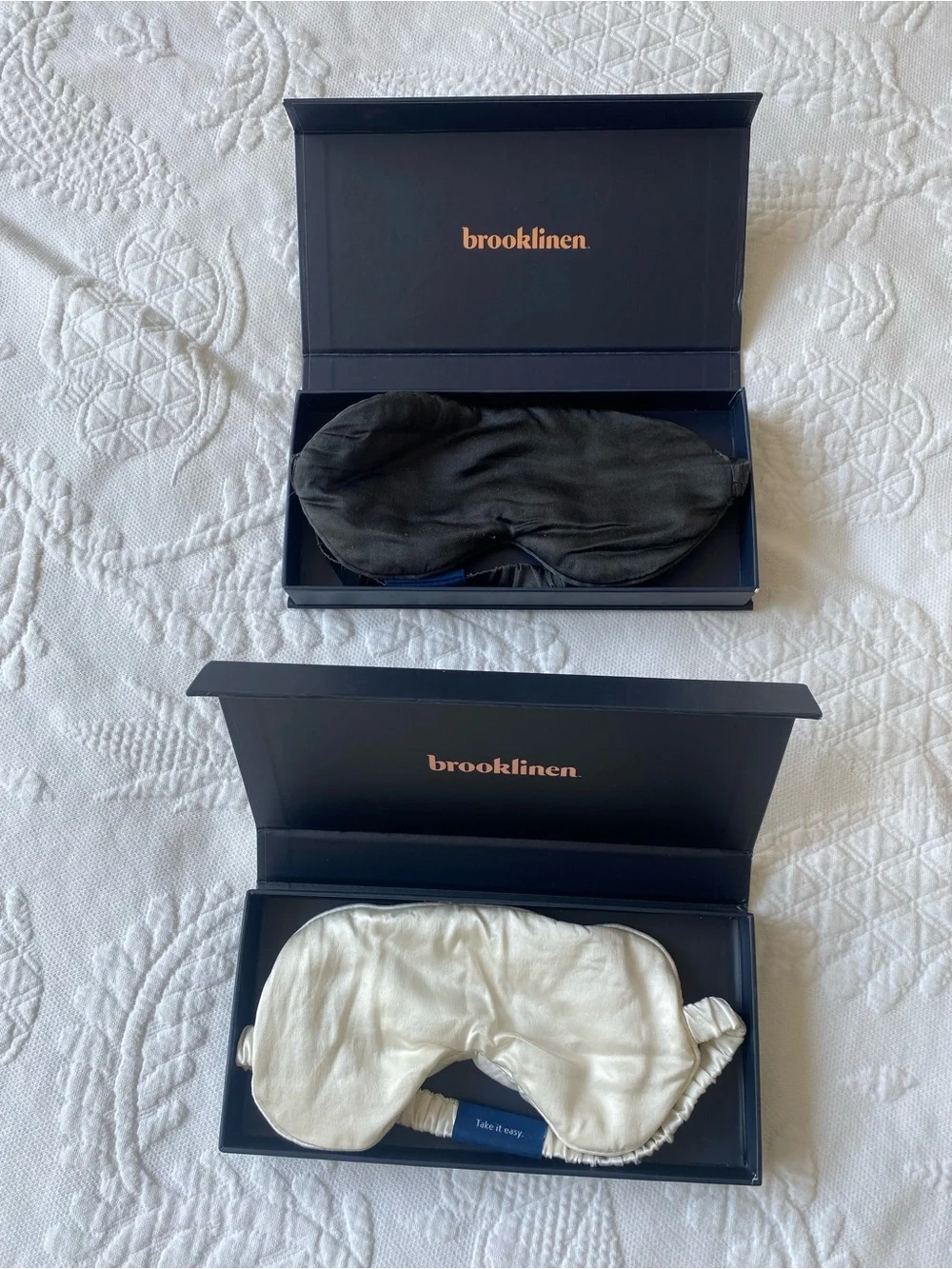 Brooklinen Mulberry Silk Black and White Sleep Masks with original packaging